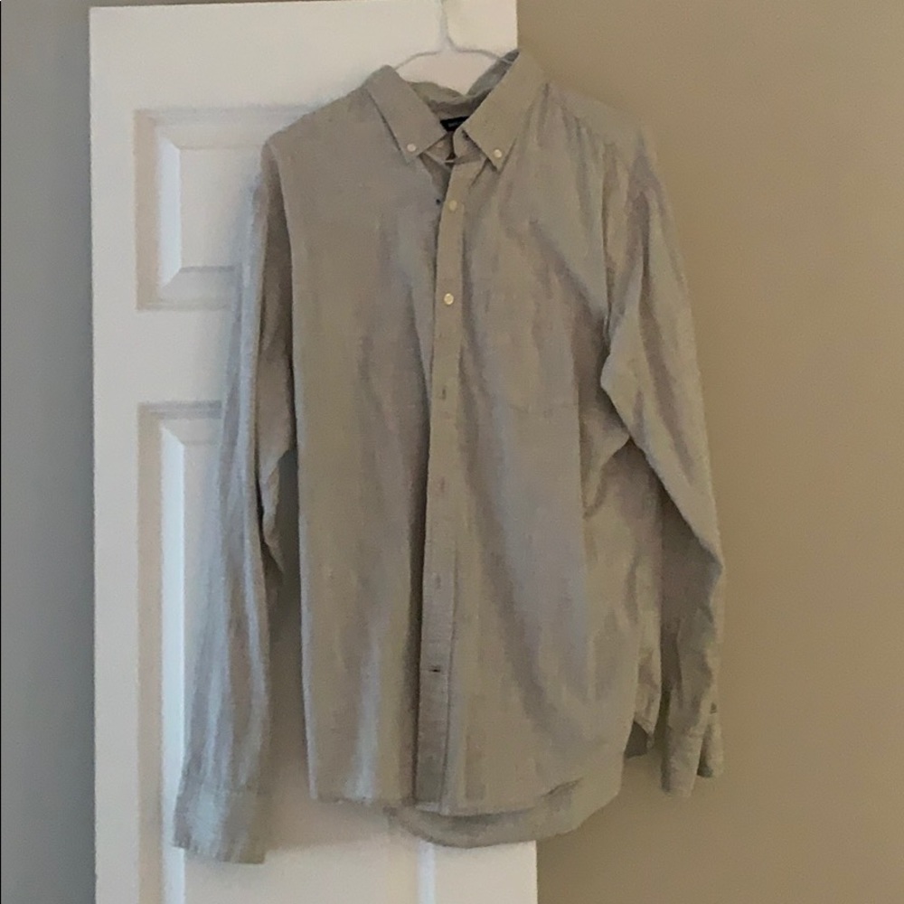 Long sleeve button up dress shirt.